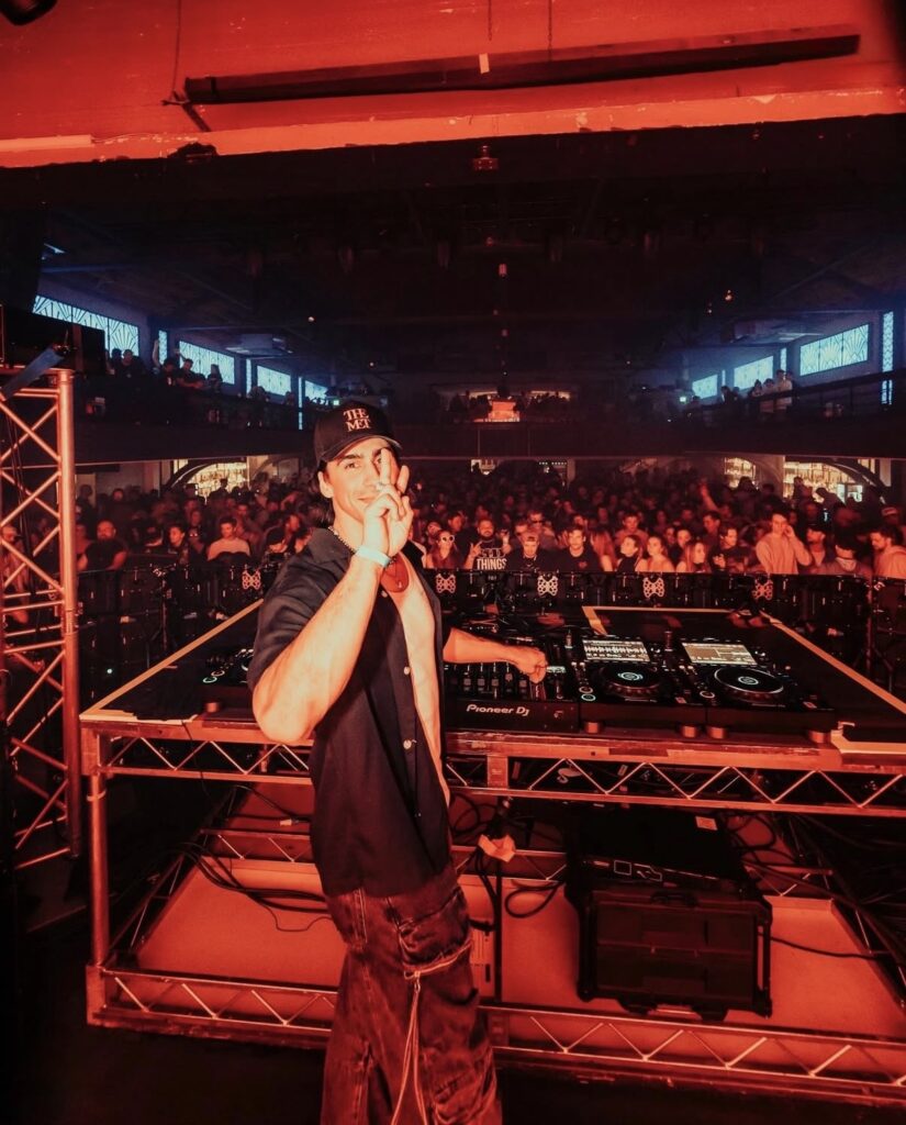 Branden Estrada behind Pioneer turntables during house music set at MILK+
