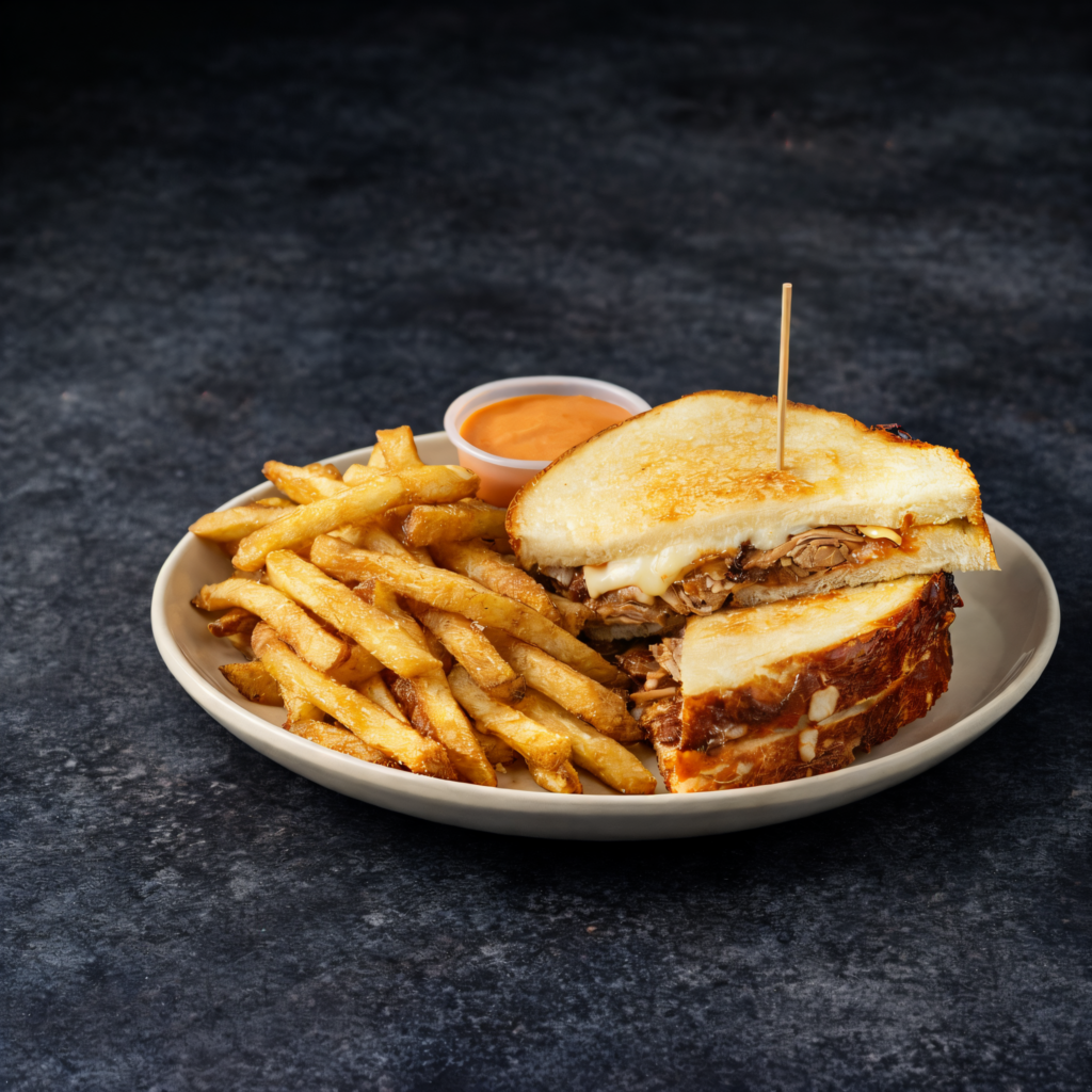 Birria grilled cheese sandwich served at MILK+ nightclub in Salt Lake City